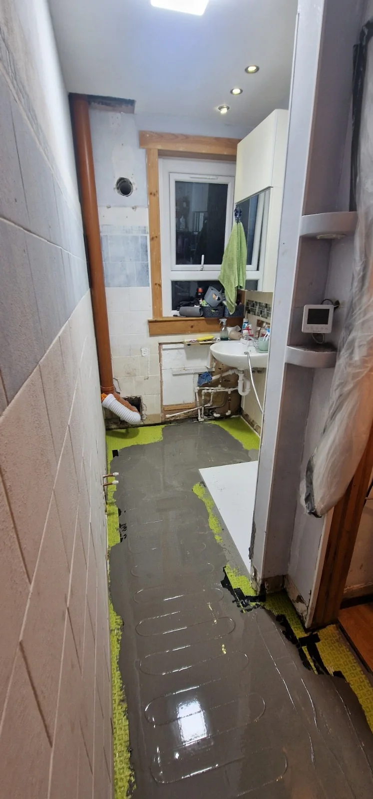 Levelling over heating — underfloor heating by AdiDeccor, West Lothian